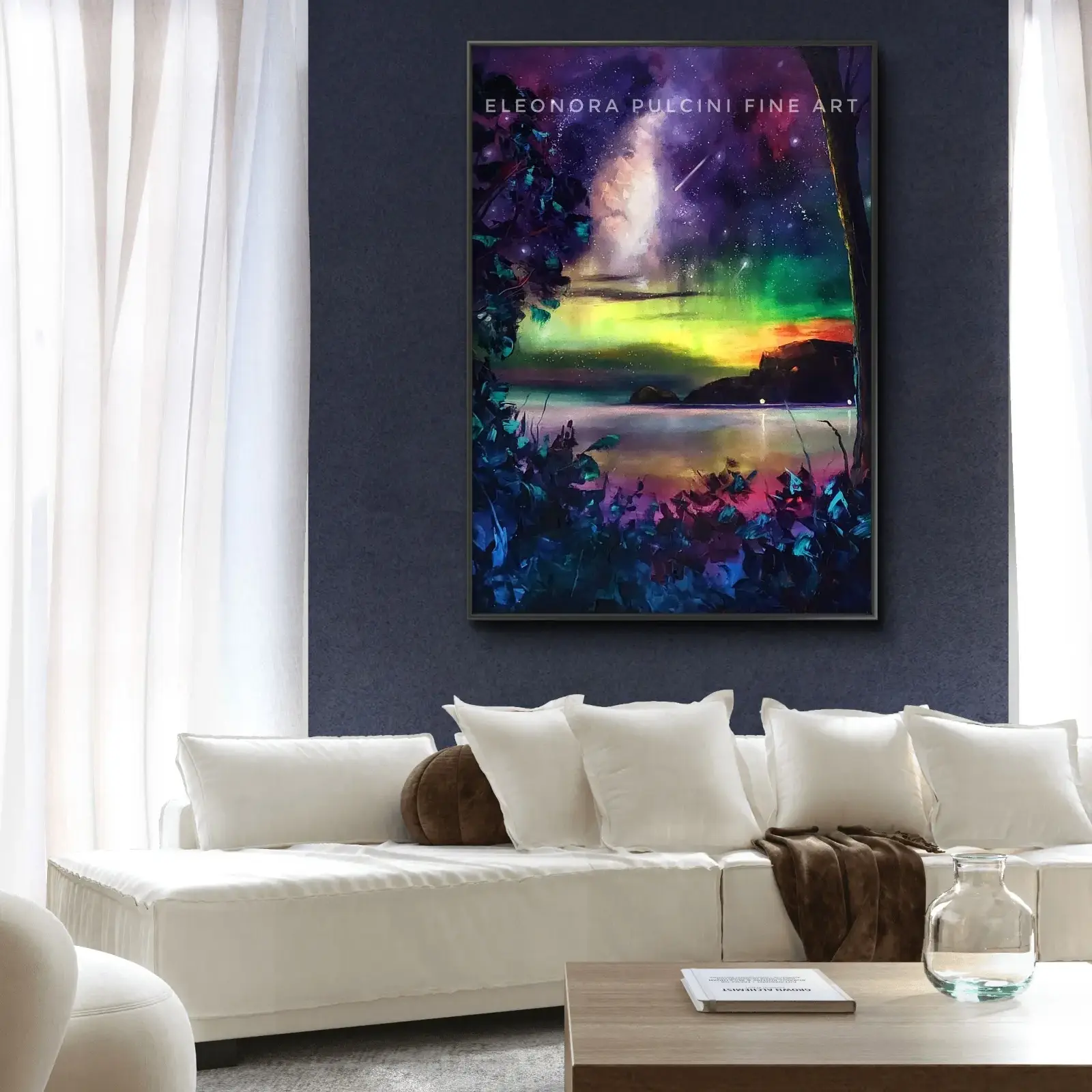 Colourful aurora artwork above modern white sofa