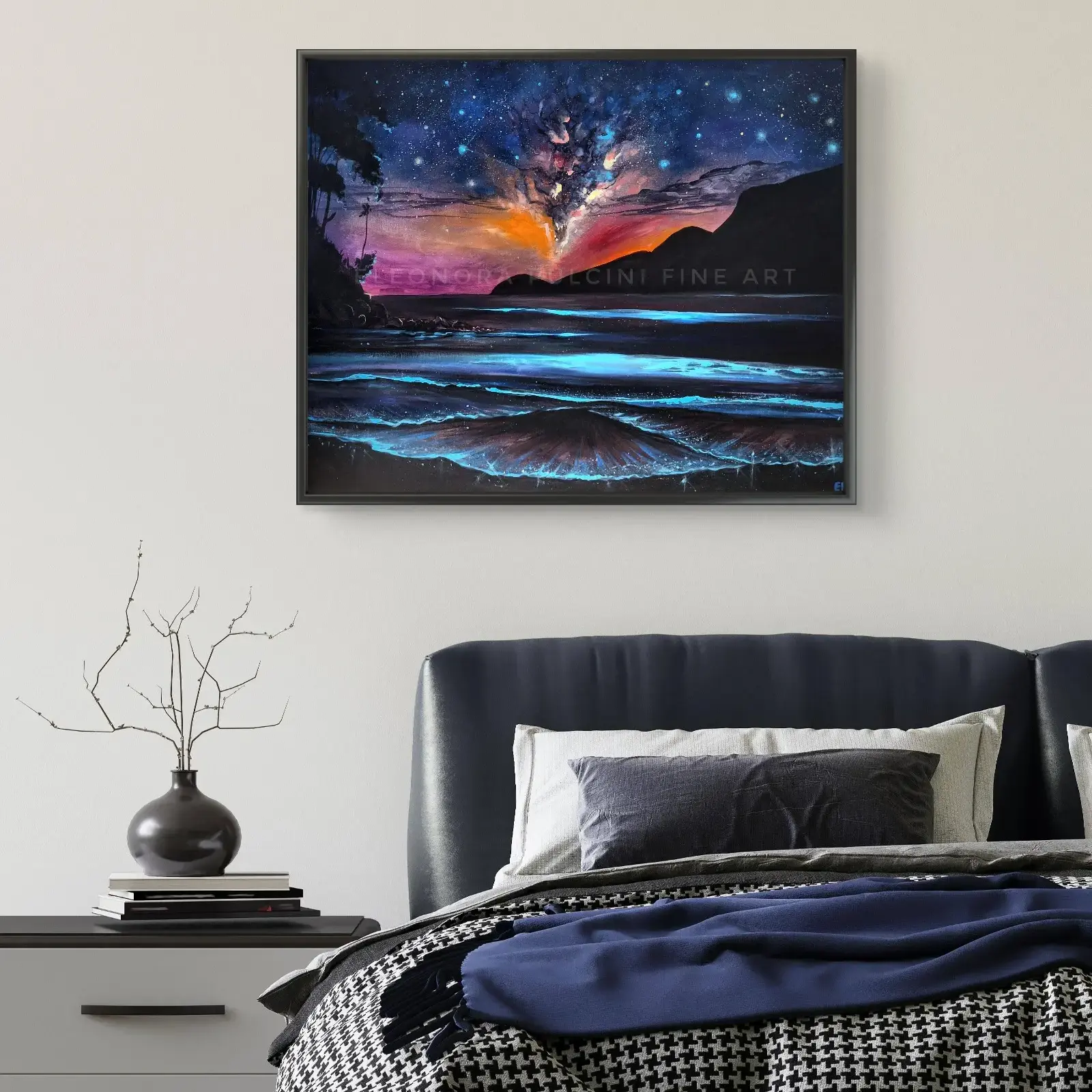 Framed cosmic seascape painting above modern bed
