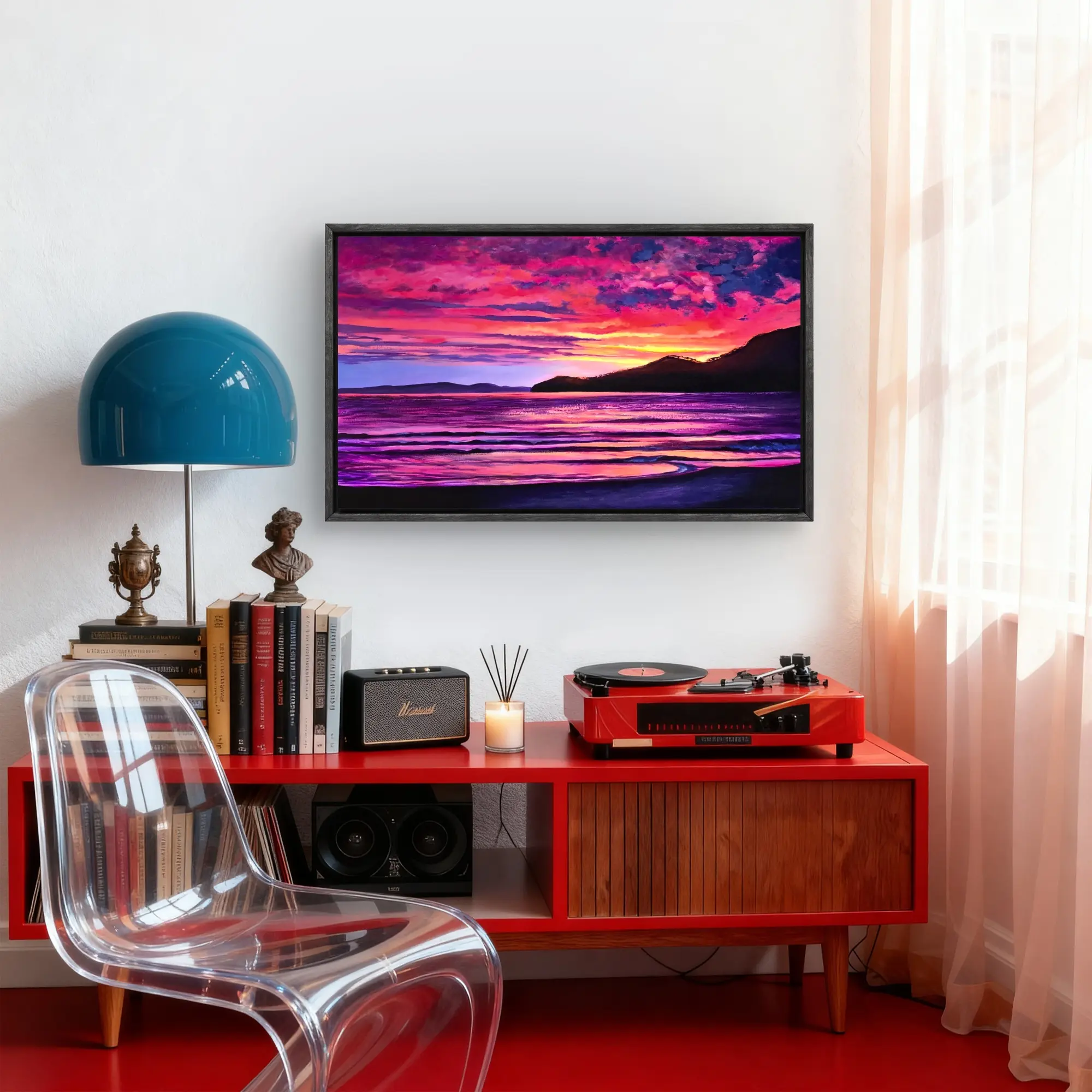 1000155712 Framed sunset seascape above red console table