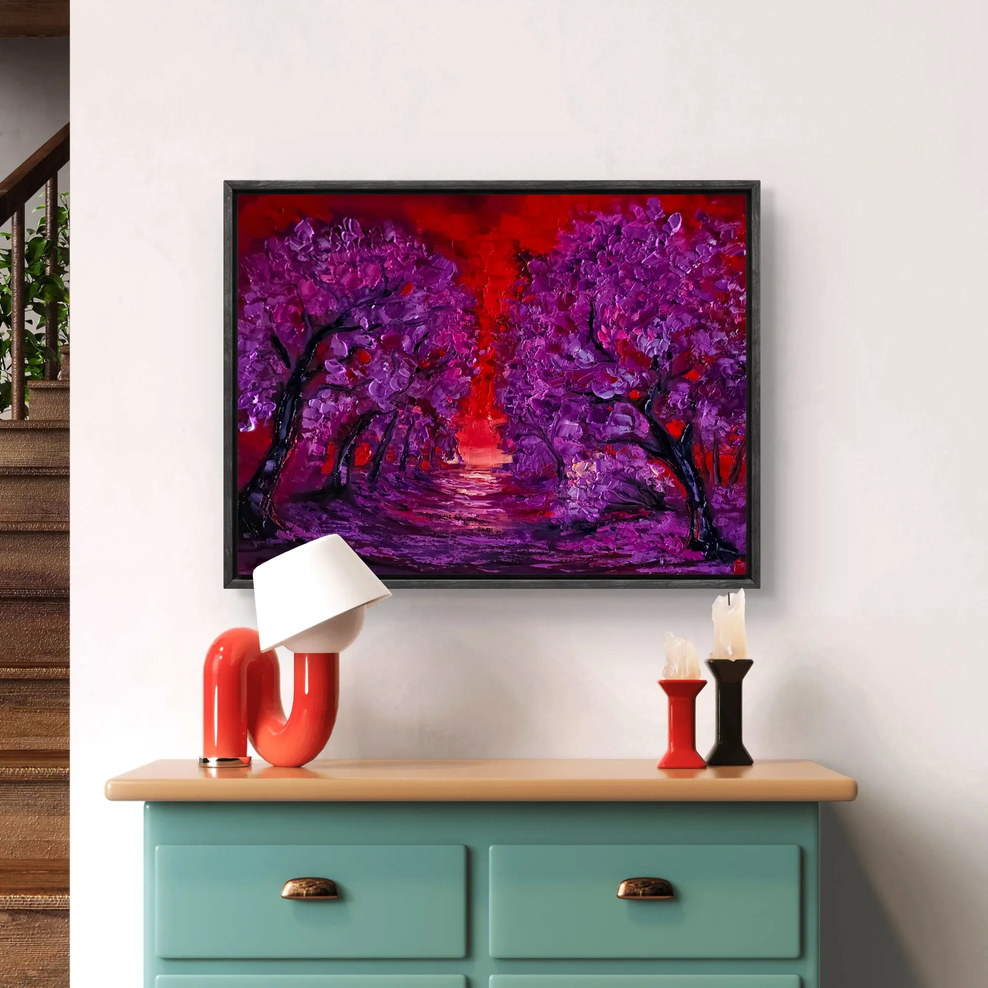 Framed purple tree painting above a turquoise sideboard