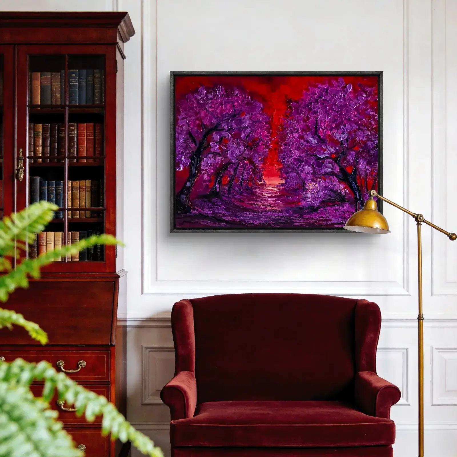 Purple tree painting above burgundy armchair in elegant study